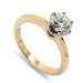 14kt yellow gold solitaire ring with round brilliant diamond in white gold six-prong setting