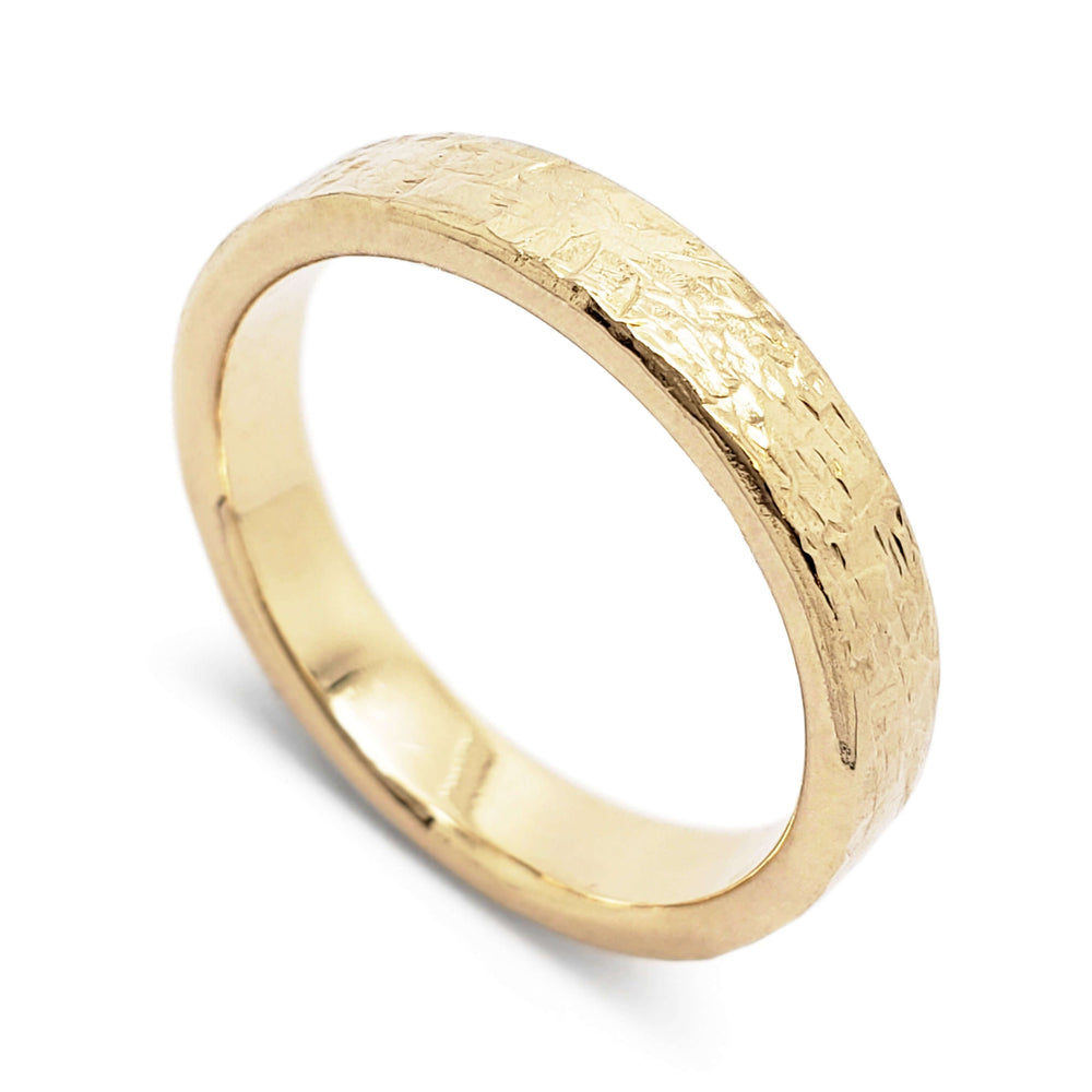 14kt yellow gold wedding ring with elephant skin texture, flat profile and polished finish