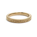 14kt yellow gold wedding ring with engraved floral pattern and millgrain border