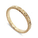 14kt yellow gold wedding ring with hand engraved Salal leaf and berry pattern and millgrain edge