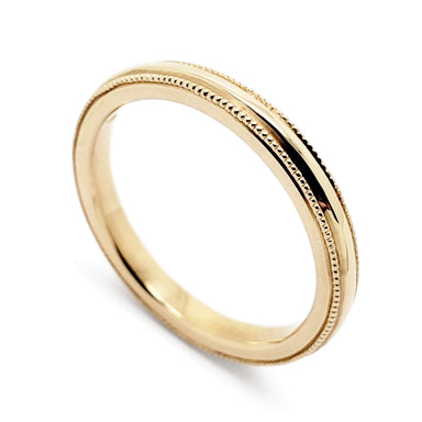 14kt yellow gold wedding ring with millgrain detail, high polish finish