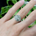 19kt white gold Art Deco diamond engagement ring worn on a hand