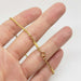 22kt yellow gold chain bracelet with clasp shown on a hand