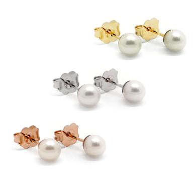 Three pairs of 5mm freshwater pearl stud earrings in yellow, white, and rose 14kt gold