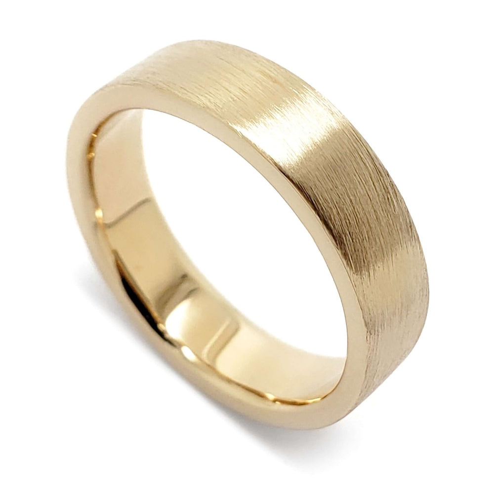 5mm brushed 14kt yellow gold flat wedding ring on white background