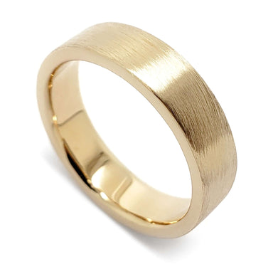 5mm brushed 14kt yellow gold flat wedding ring on white background
