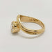 Angled side view of 14kt yellow gold curvy engagement ring with bezel-set lab diamond
