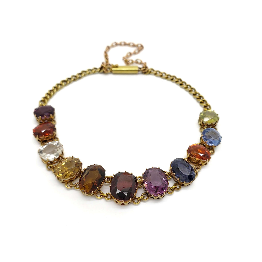 Antique 14kt yellow gold bracelet with eleven multicoloured oval gemstones in coronet settings