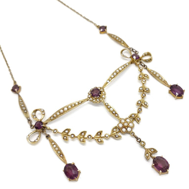 Antique lavaliere necklace in 14kt yellow gold with oval amethysts and seed pearls