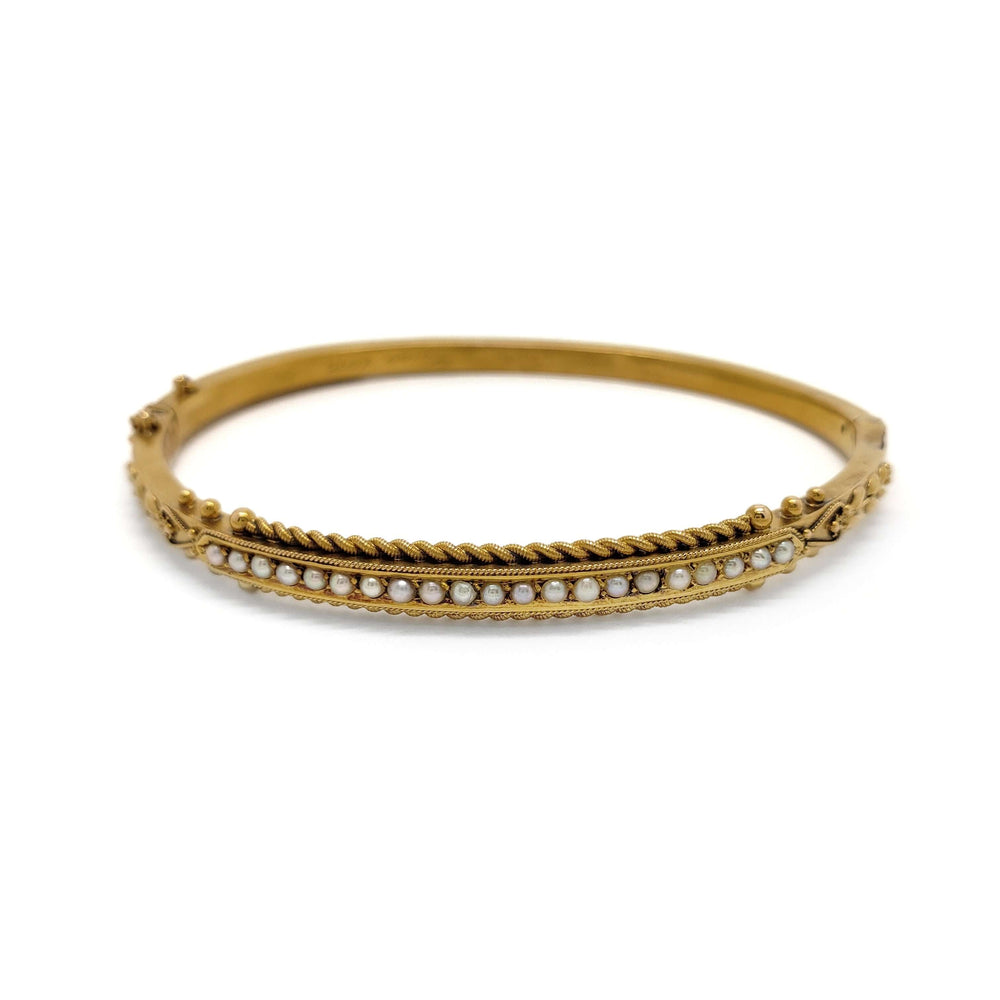 Antique 15kt yellow gold bangle set with seed pearls and intricate detailing