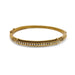 Antique 15kt yellow gold bangle set with seed pearls and intricate detailing