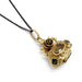 Antique 18kt yellow gold fob pendant with oval citrine and round peridot on a black chain