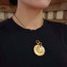 Antique 18kt yellow gold pocket watch with key worn as a pendant on a chain