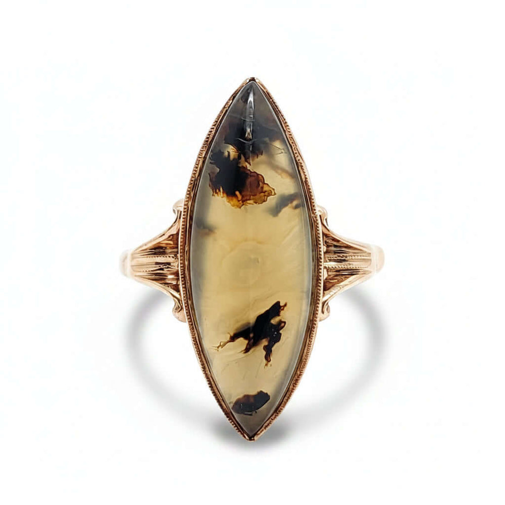 Antique marquise cut dendritic agate ring in 10kt yellow gold, swirled split-shank design, front view