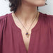 Antique amethyst and seed pearl brooch-pendant worn as a necklace