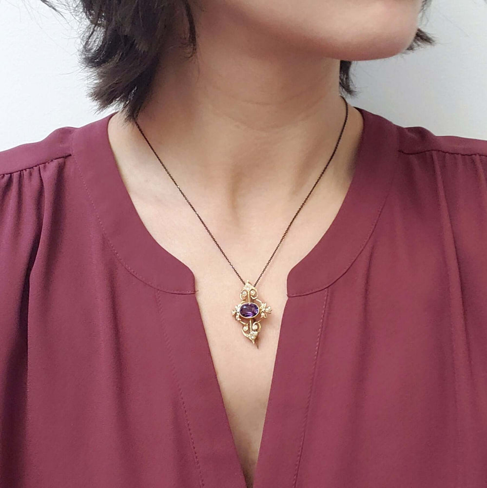 Antique amethyst and seed pearl brooch-pendant worn as a necklace