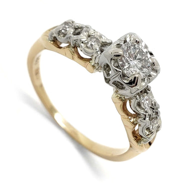 Antique five stone diamond ring in 14kt yellow and 18kt white gold, angled view