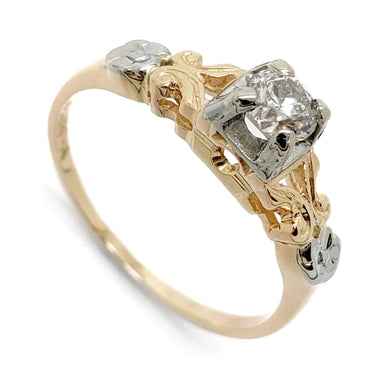 Antique floral diamond ring with 14kt yellow gold band and 18kt white gold setting, close-up