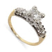 Antique illusion-set engagement ring with round brilliant diamond in white and yellow gold