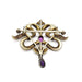 Back view of antique silver brooch showing amethyst settings and pin mechanism