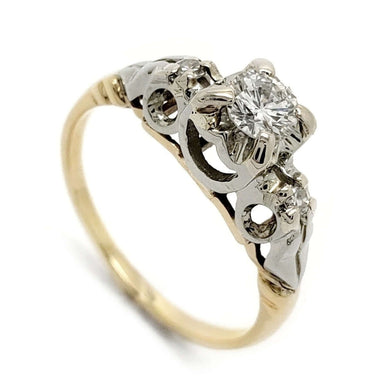 Antique two-tone engagement ring with round diamonds in 14kt yellow and 18kt white gold