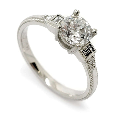 Art Deco-inspired 14kt white gold engagement ring with European cut lab diamond and baguette accents