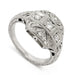 Art Deco style 19kt white gold engagement ring with bead-set round diamonds and millgrain detail