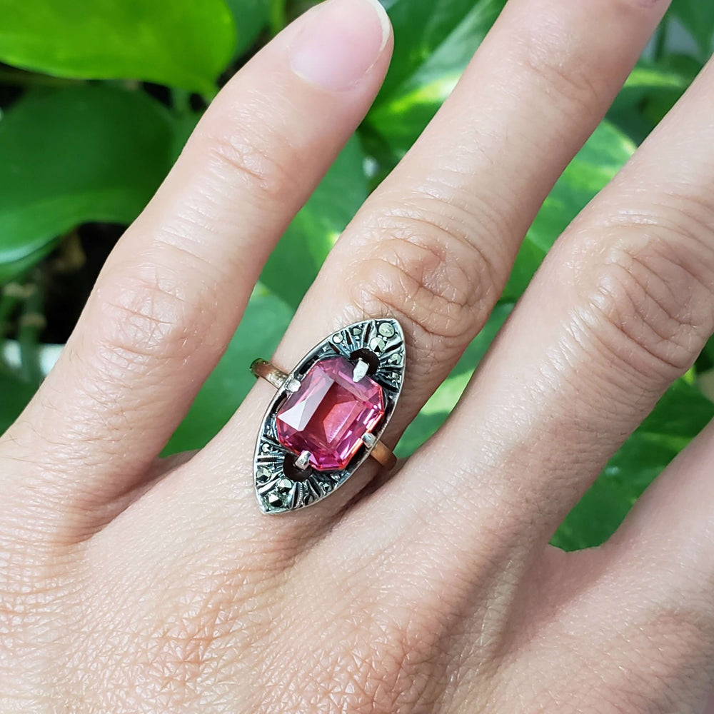 Art Deco synthetic sapphire and marcasite ring in 9kt gold and silver, worn on hand