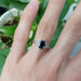 Australian sapphire and diamond white gold ring worn on hand, solitaire style