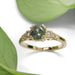 Australian sapphire and lab diamond engagement ring in yellow gold, with leaf background