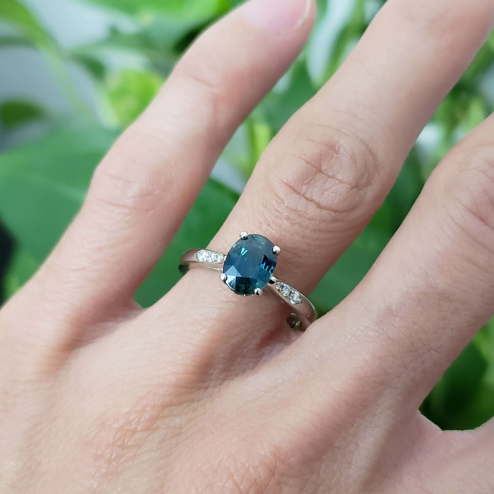 Australian sapphire and lab diamond ring in white gold, shown on hand