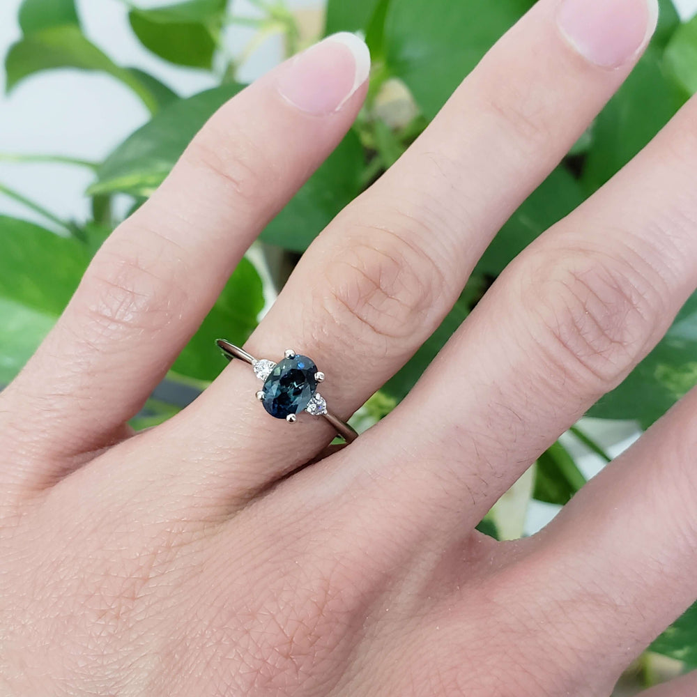Australian sapphire and lab diamond ring in white gold, worn on hand