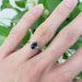 Australian sapphire and lab diamond ring in white gold, worn on hand