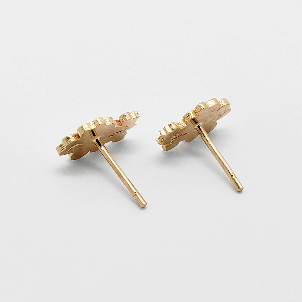 Back view of 14kt yellow gold floral stud earrings showing post and earring backs