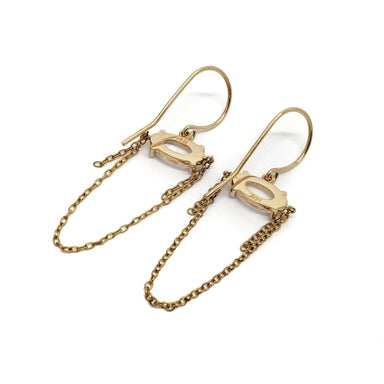 Back view of 14kt yellow gold lab diamond dangle earrings with chain design