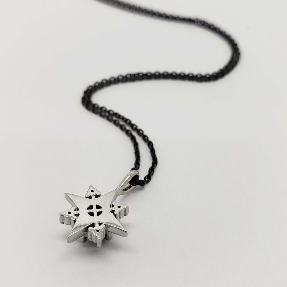 Back view of North Star pendant in 14kt white gold on black chain