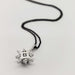 Back view of North Star pendant in 14kt white gold on black chain