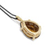 Back view of pear-shaped citrine pendant in 14kt yellow gold with black chain