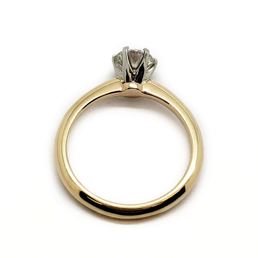 Back view of 14kt yellow gold ring with white gold six-prong diamond setting