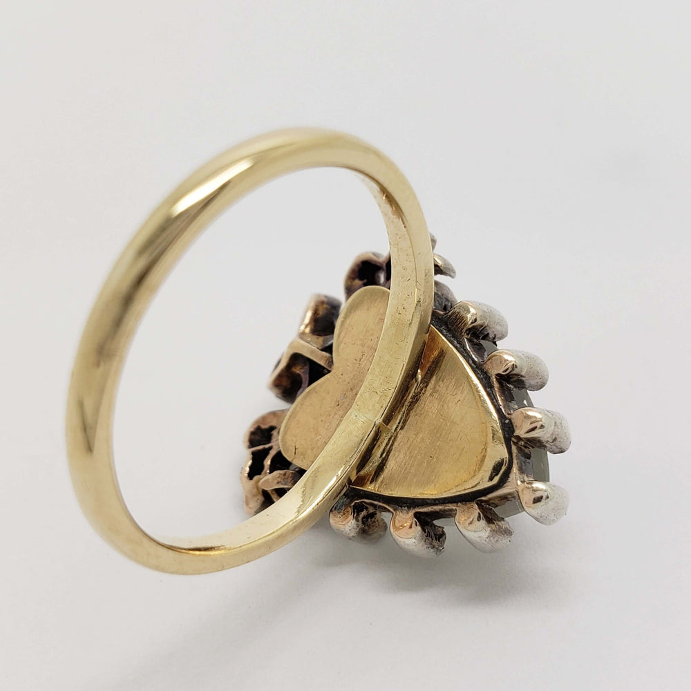 Back of Georgian heart moonstone ring showing 9kt yellow gold band and heart-shaped setting