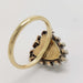 Back of Georgian heart moonstone ring showing 9kt yellow gold band and heart-shaped setting
