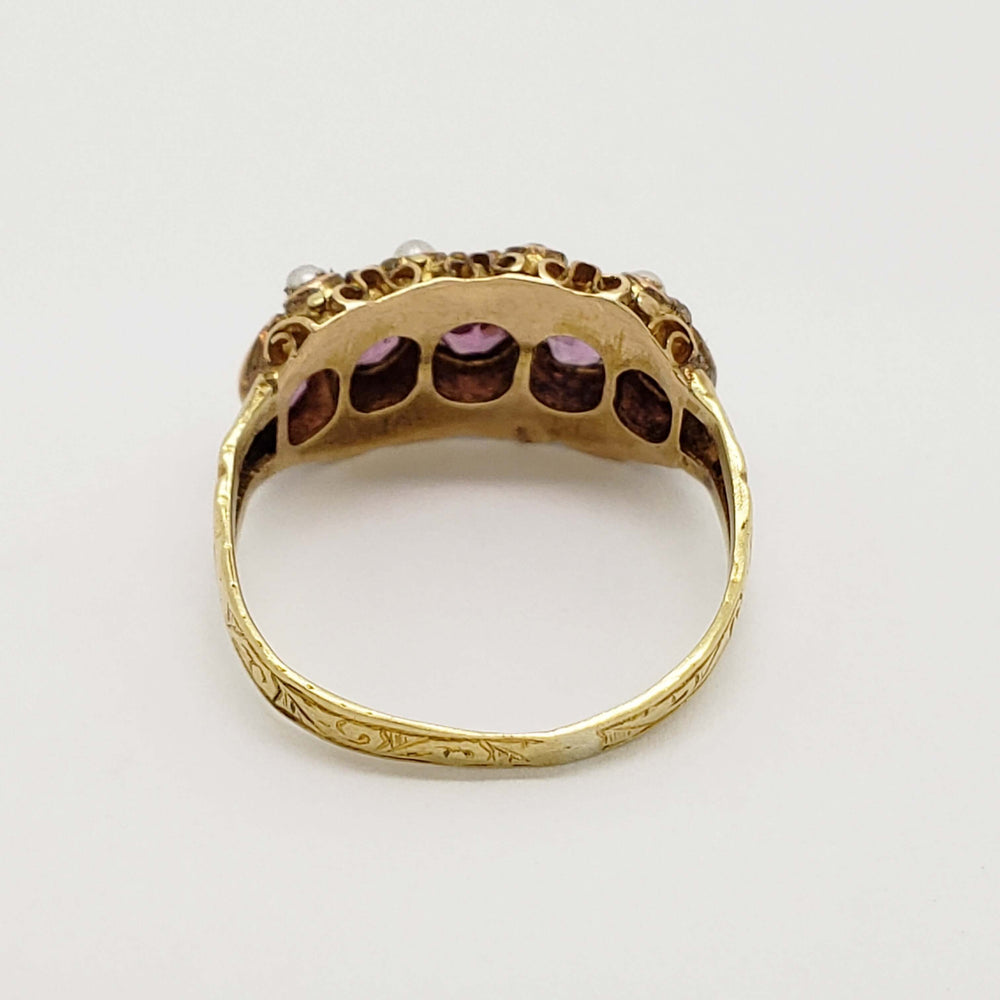 Back view of Victorian 15kt yellow gold ring showing openwork behind fluorite stones