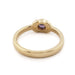 Back view of yellow gold ring with round purple Montana sapphire in bezel setting