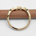 Back view of yellow gold wedding band showing polished shank