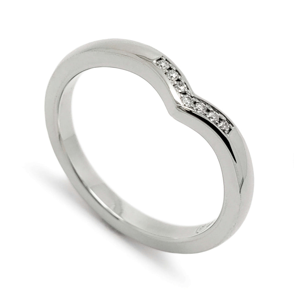 Chevron wedding ring in 14kt white gold with pavé set Canadian diamonds, angled view