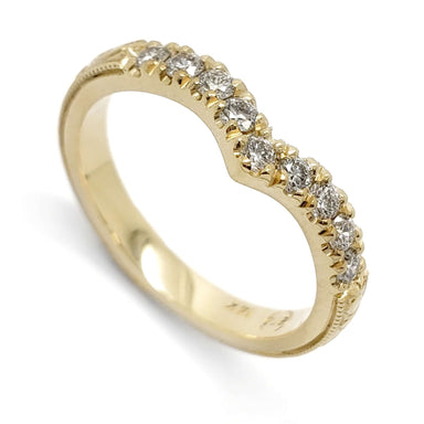Chevron wedding ring in 14kt yellow gold with prong-set lab-grown diamonds and millgrain detail