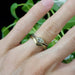 Chevron yellow gold wedding band paired with marquise diamond engagement ring