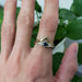 Chevron yellow gold wedding ring stacked with sapphire and diamond engagement ring