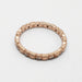 Circle and square motif rose gold diamond ring on white background