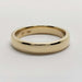 Classic 14kt yellow gold low dome wedding band on white background